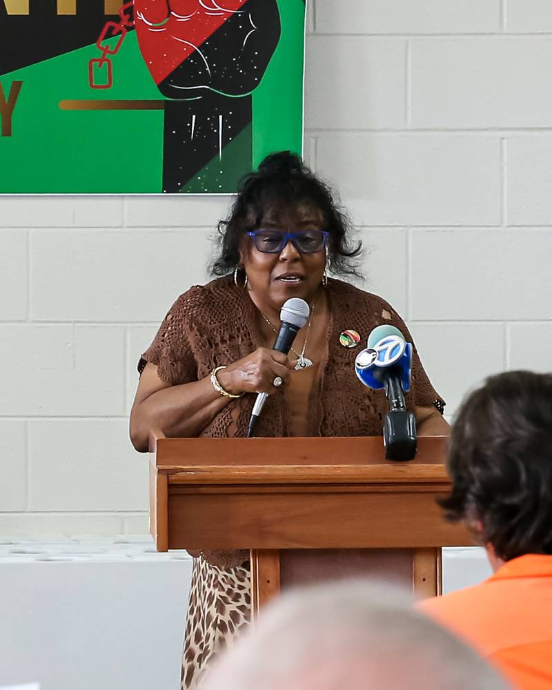 Dr. Marvel Parker introduces her husband Pastor Wheeler Parker Jr to speak during the Juneteenth Celebration in La Grange. June 20, 2022