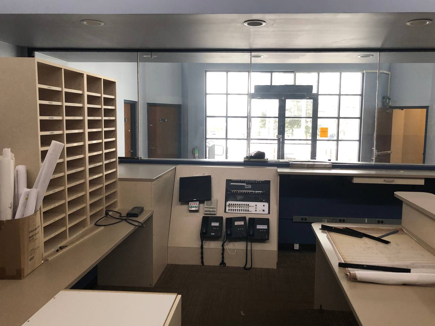 Front desk (facing lobby) still encased in bullet proof glass