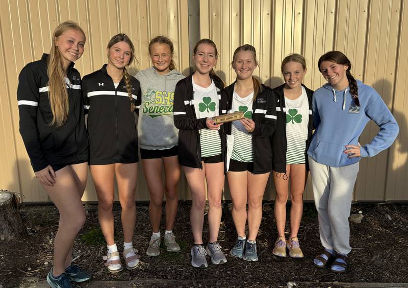 The Seneca girls cross country team ran to the Tri-County Conference title on Tuesday at Seneca Ag Farm.