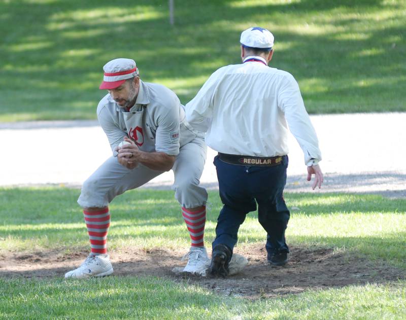 Oregon Ganymedes first baseman Tim "Two Base" Strohecker squeezes a throw for an out at the 21st Annual World Tournament of Historic Base Ball in Dearborn, Michigan on Saturday, Aug. 10, 2024.