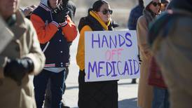 Residents protest proposed cuts to Medicaid  at DuPage County rally