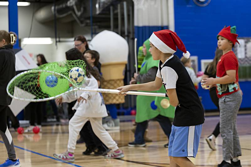 Denizens of the Grinch, aka the Rock Falls Middle School student council, puts up a fight against the kid hoard Saturday, Nov. 18, 2023 during during the dodgeball fight.