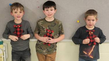 Leaf River Soaring Eagles stuff Teddy bears for 4-H Cares Project