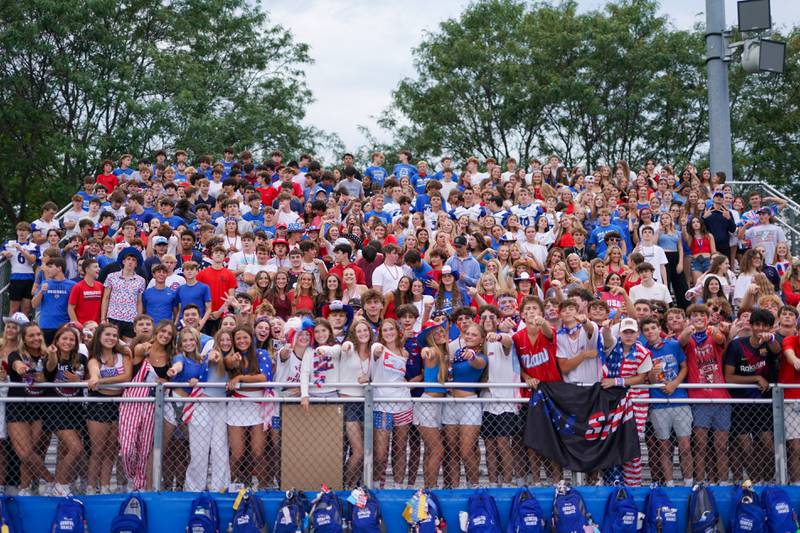 The Geneva Blue Crew cheer on their Geneva Vikings against Larkin prior to kick-off of their football game at Geneva High School on Friday, Aug 30, 2024.