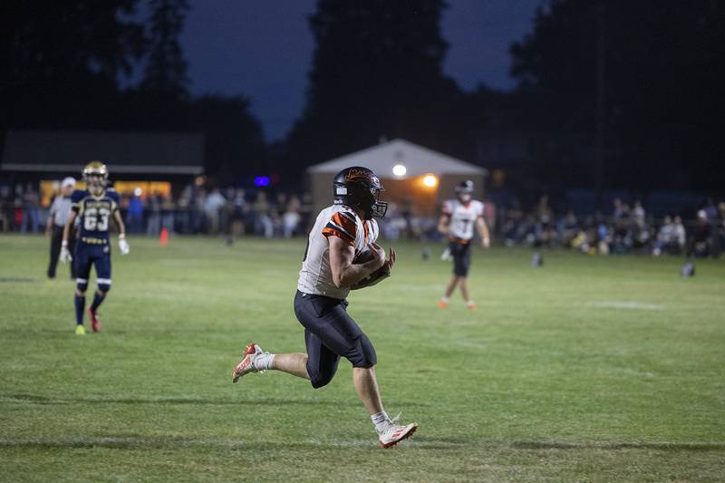 Milledgeville’s Karter Livengood hauls in a pass for the Missile’s first TD of the game against Polo Friday, Sept. 19, 2025.