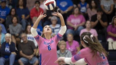 Photos: Newman faces off against E-P in volleyball