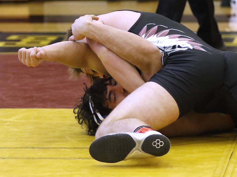 Marengo’s Connor Sacco pins Genoa-Kingston’s Xander Gleissner in their 170-pound championship wrestling match in the IHSA 1A Richmond-Burton Wrestling Regional Thursday, Jan. 19, 2023, at Richmond-Burton High School in Richmond.