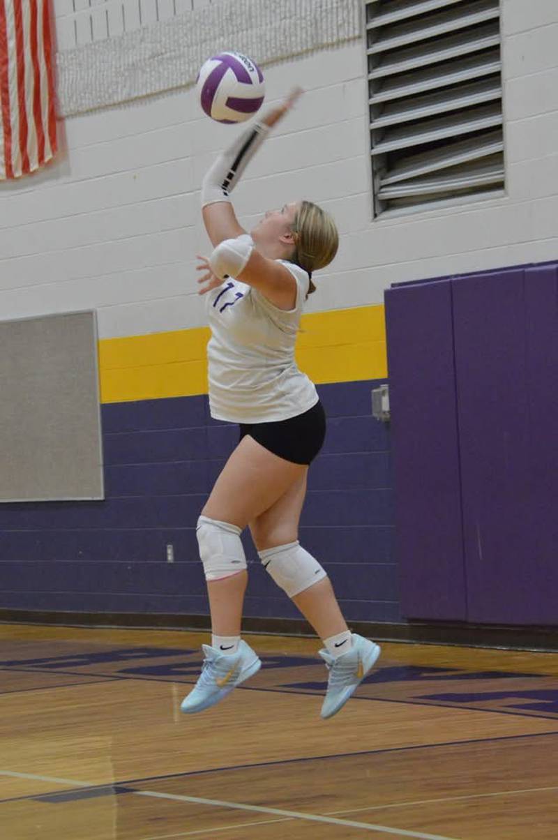 Rochelle's Cali Metzger serves the ball during an eighth-grade girls volleyball match with Burlington Central on Sept. 8.