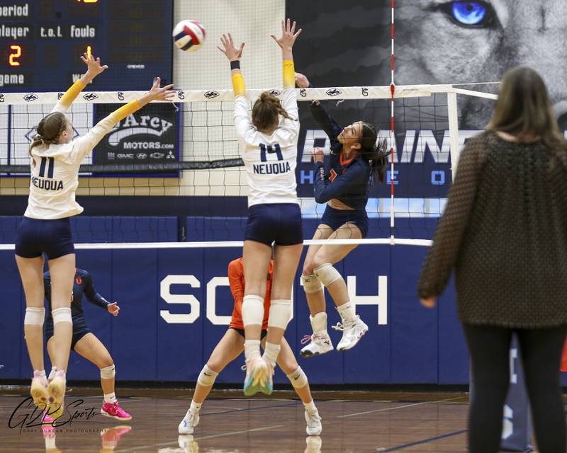 Oswego's Hannah Herrick (7) for the kill during Class 4A Regional Final volleyball match between Neuqua Valley at Oswego. Oct 30, 2025 in Plainfield.