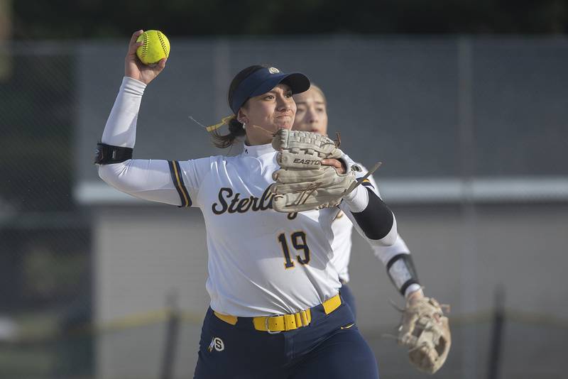 Sterling’s Lily Martinez throws to first for an out against Dixon Tuesday, March 24, 2026.