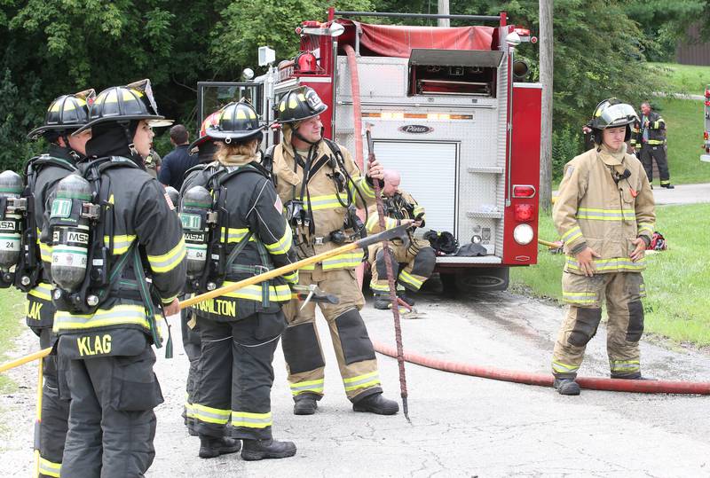 Firefighters from Utica and Oglesby respond to the scene of a fully-engulfed structure fire in the 500 block of North 2782nd Road on Monday, July 21, 2025 in La Salle. FIre departments from Utica, Wallace, Naplate, Spring Valley, Mendota, Troy Grove, La Salle, Peru, Oglesby and Tonica responded to the scene. Fire crews were dispatched at 9:45 a.m. La Salle Police and La Salle County Sheriff were also on the scene.