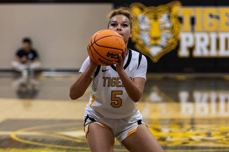 Joliet West's Niyonna Reddington shoots a free throw during a varsity girls basketball game against Romeoville at Joliet West on Dec. 11, 2025.