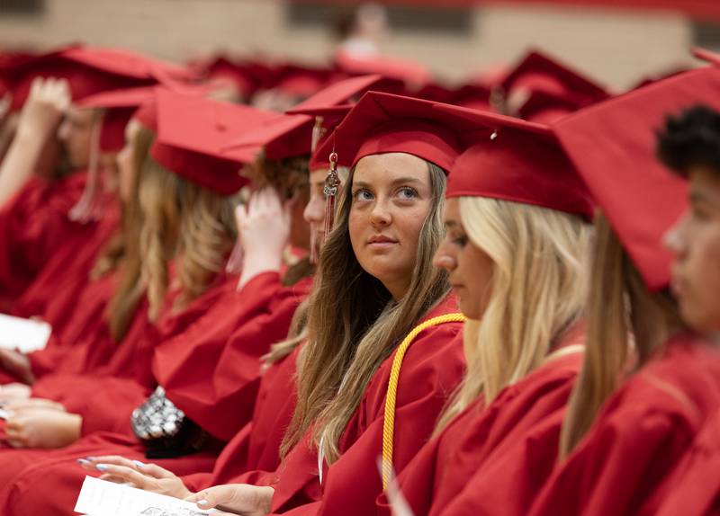 Senior Peyton Bryson looks into the stands filled with family and friends Friday, May 24, 2024, during Ottawa High School graduation.