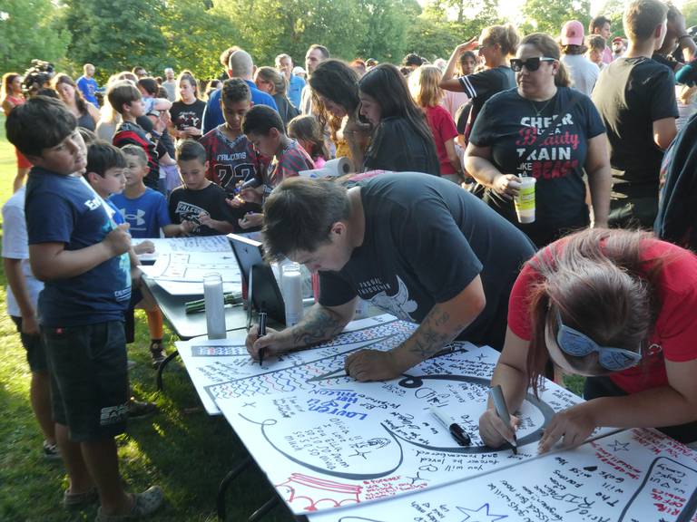 A prayer vigil and balloon release was held at Oriole Park in Chicago on Monday night, August 1, 2022 to mourn the loss of seven killed, including Lauren Dobosz and her four children, in a tragic car crash that occurred Sunday on I-90 near Hampshire.