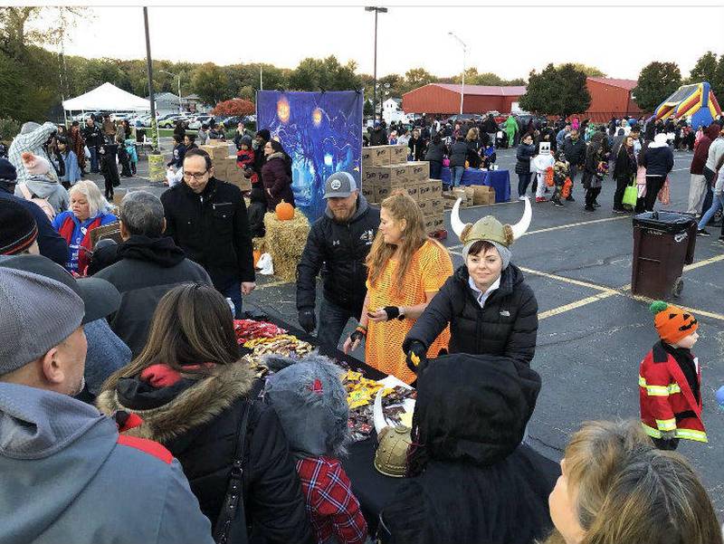 A. Vito Martinez Middle School in Romeoville participated in handing out goodies at the Village of Romeoville Halloween Fest.