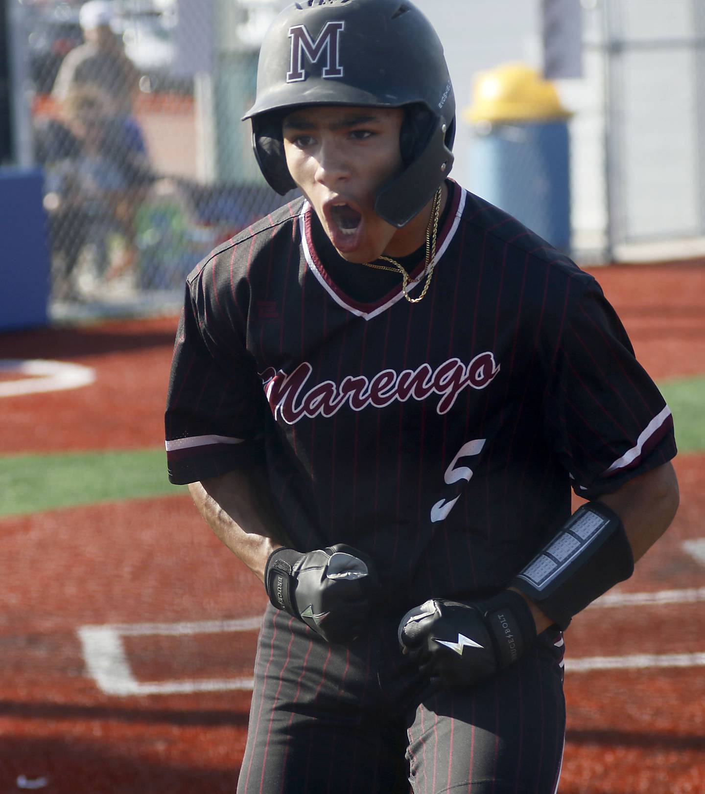 Marengo's Brayden Jenkins celebrates scoring a run during a Kishwaukee River Conference baseball game against Johnsburg  on Wednesday, April 22,2026, at Johnsburg High School.