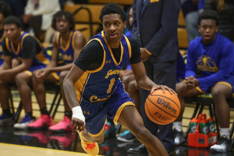 Joliet Central’s Bernal Fox looks to make a play against Joliet West on Tuesday, Feb. 17, 2026 in Joliet.