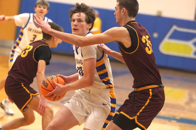 Johnsburg’s Josh Kaunus moves the ball against Richmond-Burton in varsity boys basketball onTuesday, Dec. 9, 2025, at Johnsburg High School in Johnsburg.