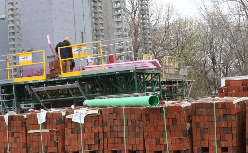 Many pallets of bricks are being used to build the exterior wall of the La Salle-Peru Township High School's new Agriculture Center on the southeast corner of Sixth and Creve Coeur streets on Wednesday, April 1, 2026 in La Salle.