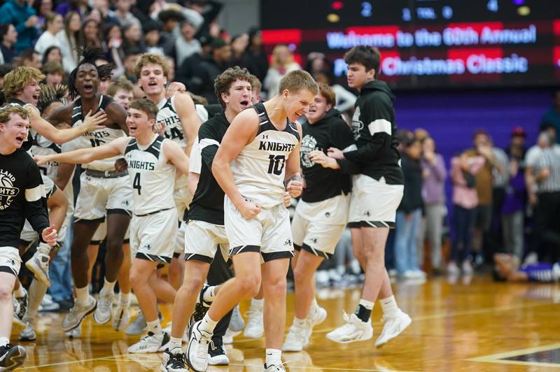 Kaneland’s Troyer Carlson (10) reacts after defeating Plano to win the 60th annual Plano Christmas Classic Basketball Tournament at Plano High School on Saturday, Dec 30, 2023.