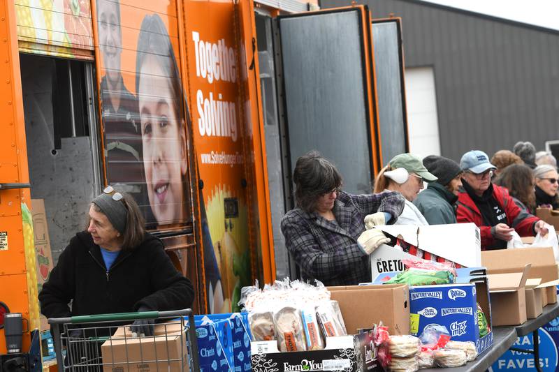 Volunteers from the Polo Lifeline Food Pantry helped distribute food items on Wednesday, Nov. 19, 2025 when the Northern Illinois Mobile Food Bank's mobile market truck stopped in Polo.