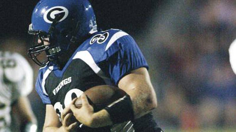 Geneva linebacker Brennan Quinn intercepts a pass thrown by Sycamore High School quarterback Michael Buckner during 1st qtr. action in Geneva, September 26,2008. | Chronicle file photo