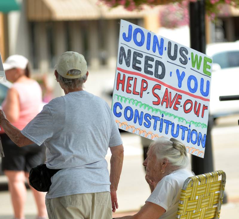 There was a variety of signs displayed during Indivisible of Ogle County's rally Saturday, Aug. 16, 2025, in Oregon. About 60 people gathered on one corner of the Ogle County Courthouse Square to protest policies and executive orders of President Donald Trump and his administration.