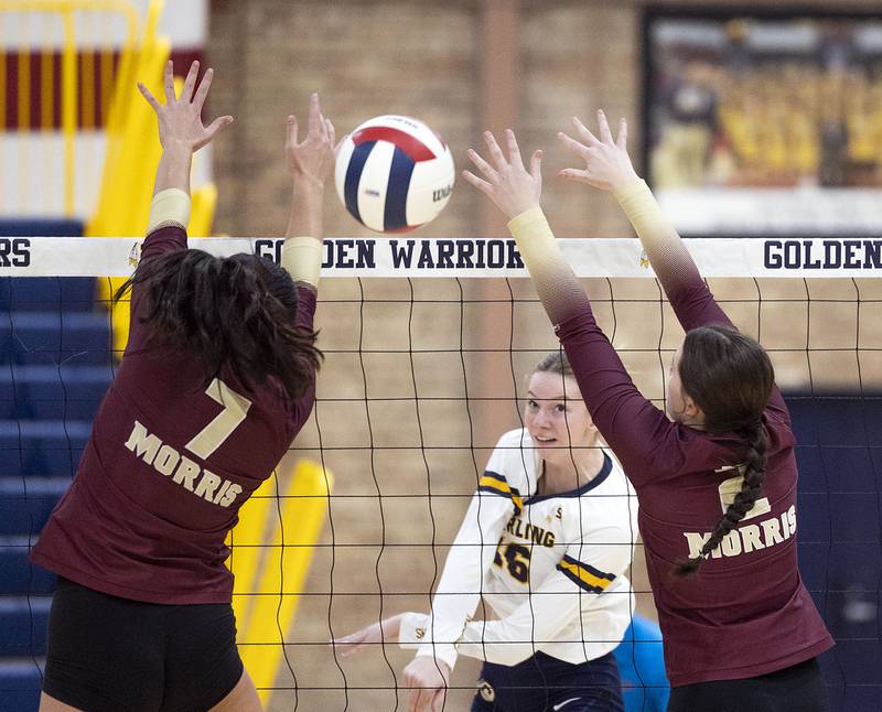 Sterling’s Kasey Weeks hammers the ball against Morris Thursday, Oct. 30, 2025, in the Class 3A volleyball regional.