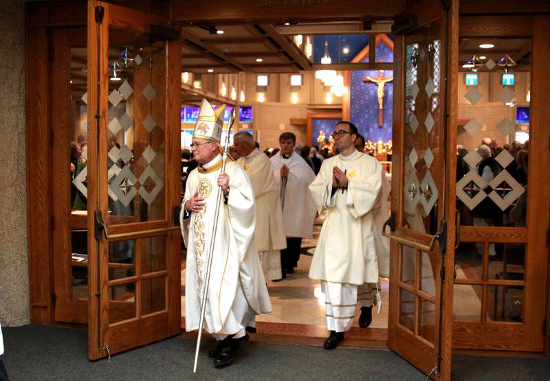 The Most Reverend David Malloy, Bishop of Rockford, exits  St. Peter Catholic Church in Geneva following the Mass of Christian Burial for Reverend Jonathan Bakkelund on Wednesday, Jan. 31, 2024.