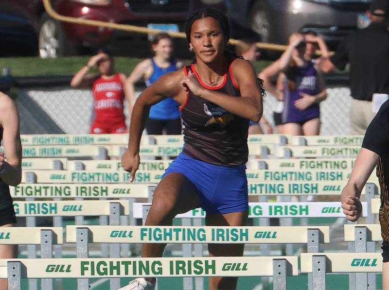 Newark's Kyla Wesseh competes in the 100 meter hurdles during the Class 1A Sectional meet on Thursday, May 14, 2026 at Seneca High School.