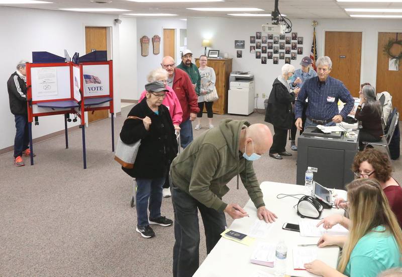 A long line of voters wait to vote at the Oglesby Fire Station on Tuesday, April 4, 2023 in Oglesby.