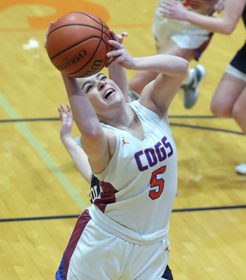 Genoa-Kingston's Zoe Boylen gets a layup in front of Polo's Madison Glawe during their game Monday, Jan. 29, 2024, at Genoa-Kingston High School.