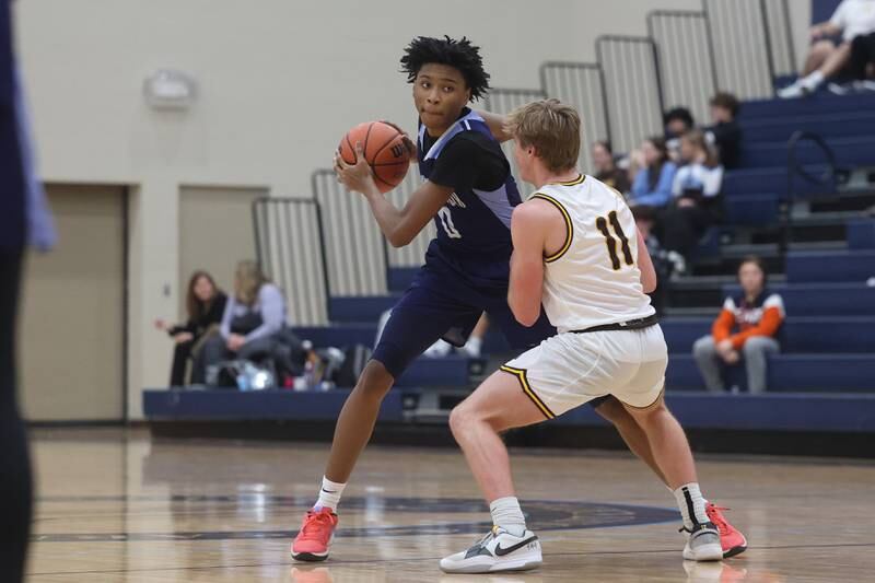 Plainfield South’s Kareem Parker waits to make a move against Joliet Catholic on Wednesday, Jan. 17th, 2024 in Joliet.