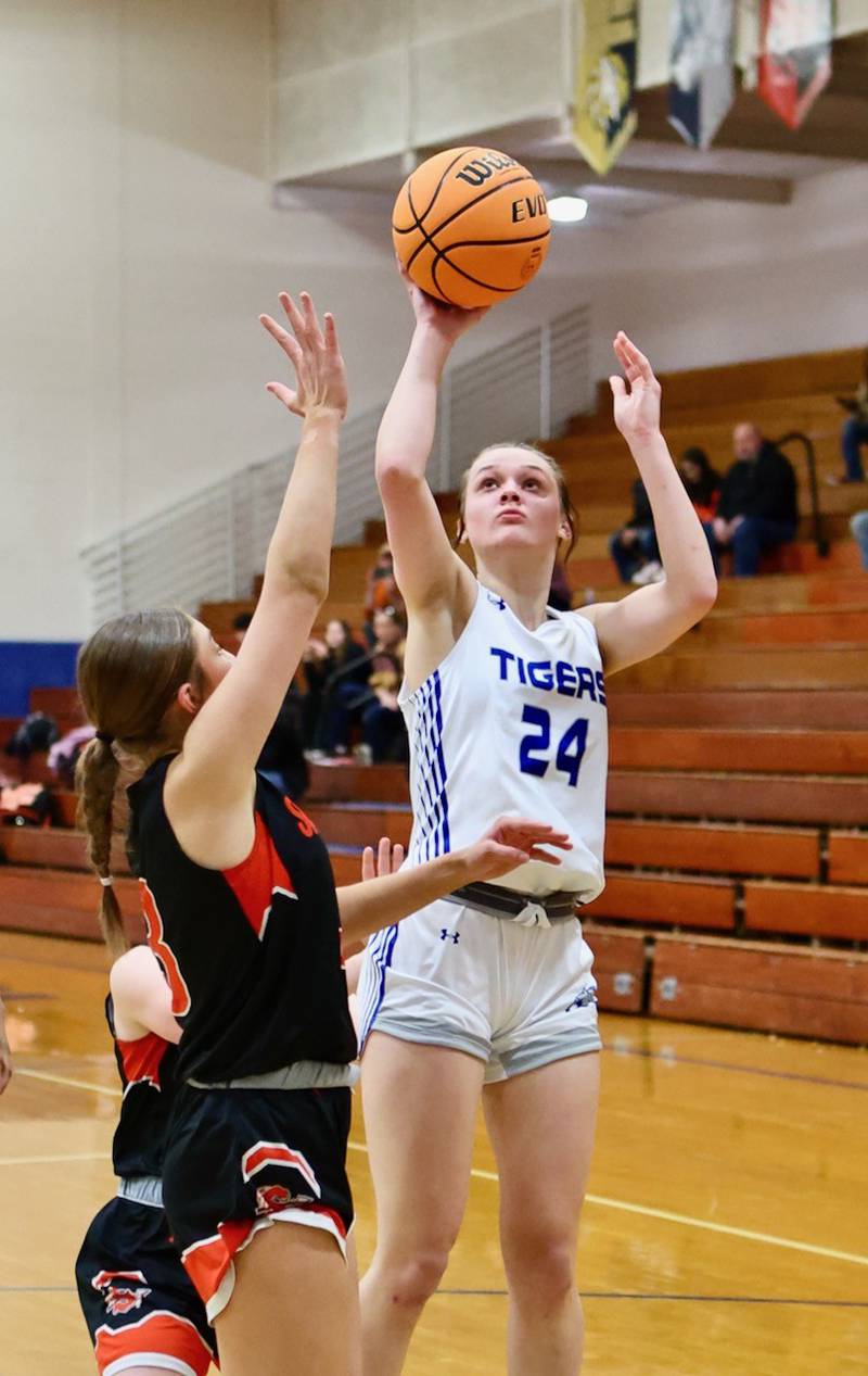 Princeton's Keighley Davis shoots against Sandwich in regional semifinal play Tuesday at Prouty Gym. The Tigresses won 50-35..