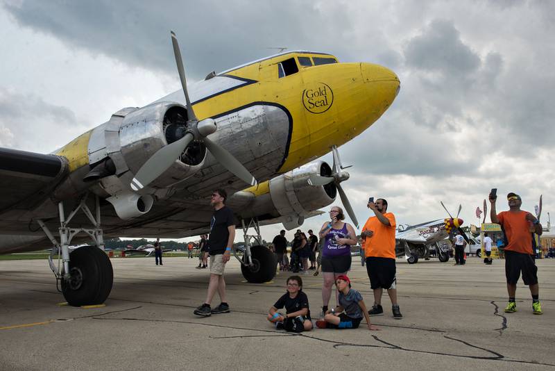 Visitors take videos of the show from the tarmac at Whiteside County Airport. After a full day of activity on Saturday, the group will take off and fly to Oshkosh, Wisconsin Sunday morning.