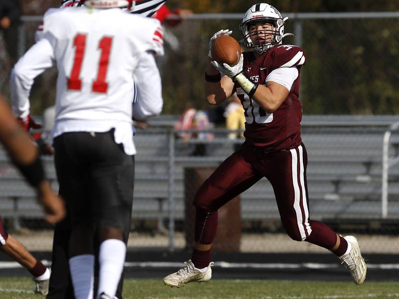Prairie Ridge's Giovanni Creatore intercepts a Chicago Goode's Zacharias Pagan pass during an IHSA Class 5A first-round football game on Saturday, Nov. 2, 2024, at Prairie Ridge High School in Crystal Lake.