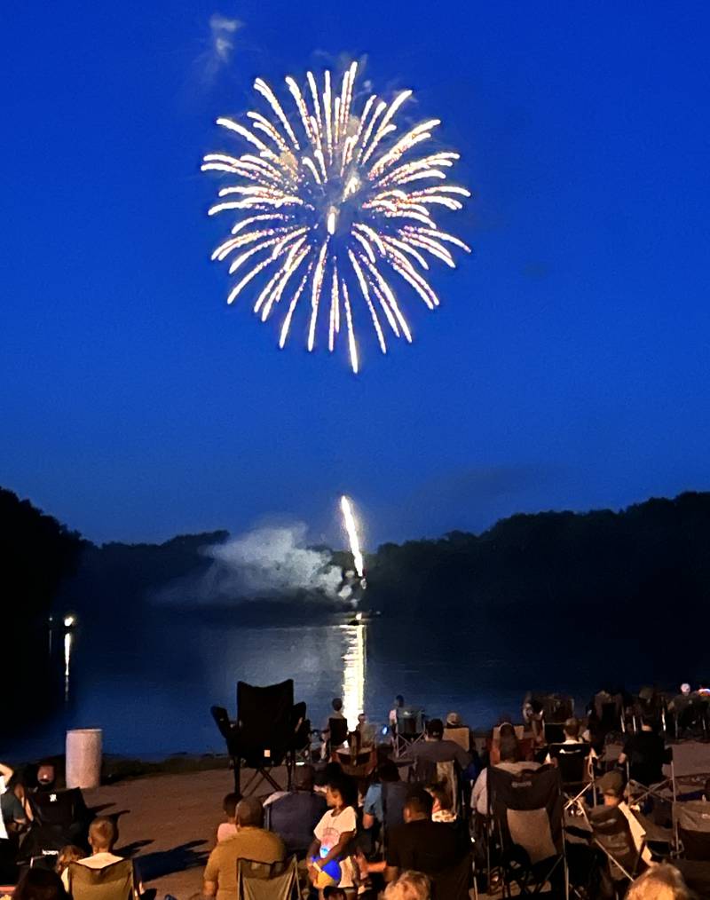 A firework explodes over the Rock River at Prophetstown State Park on Saturday, July 6, 2024.