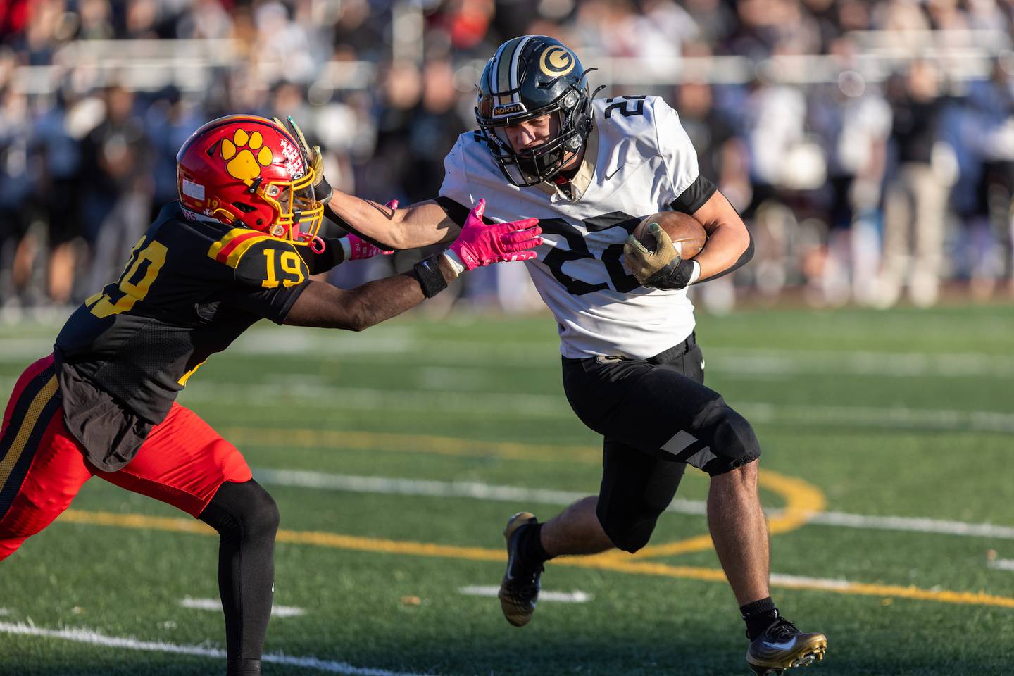 Batavia's Sai'mar Howell goes for the tackle on Glenbard North's Donato Gatses at the Class 7A Quarter Final on Saturday, Nov.15,2025 in Batavia.