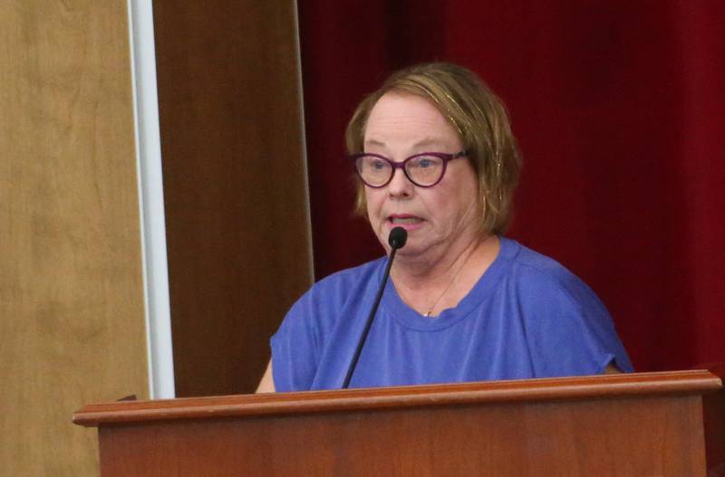 Barbara Jones speaks to the Illinois Health Facilities and Services Review Board during a public hearing regarding OSF St. Elizabeth Hospital's plans to reduce services on Tuesday, June 10, at Central Intermediate School in Ottawa.