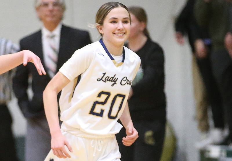 Marquette's Kaitlyn Davis reacts after draining a three-point basket late in the fourth quarter against St. Bede during the Class 1A Regional semifinal game on Tuesday, Feb. 18, 2025 at St. Bede Academy.