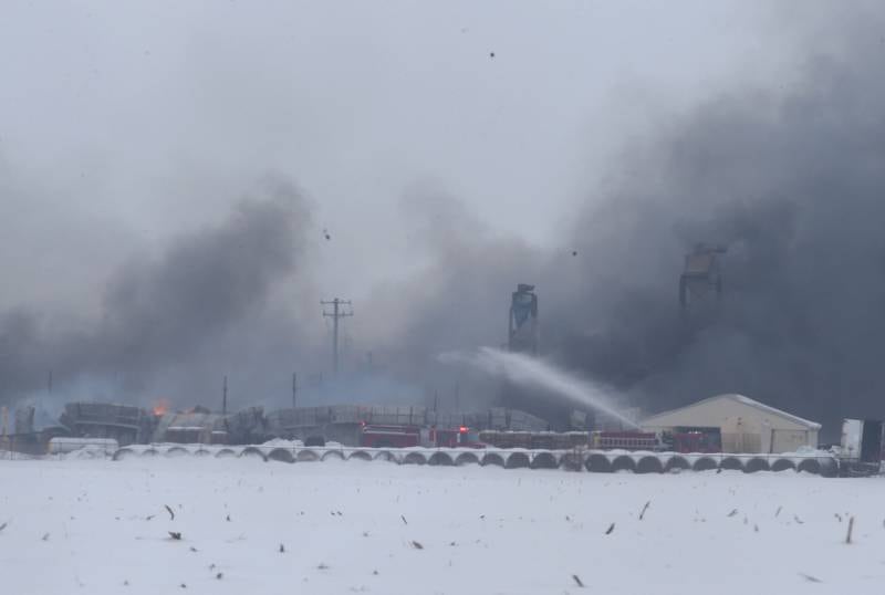 Firefighters spray water on the fire at LSC Environmental Products on Monday, Jan. 22, 2024 near Lostant. The company was the former Phoenix Paper Products. It is located between Tonica and Lostant off of Illinois 251.