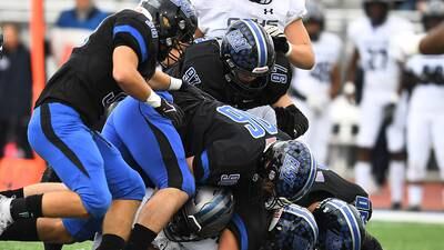 Lincoln-Way East flips its playoff switch, turns away Oswego East