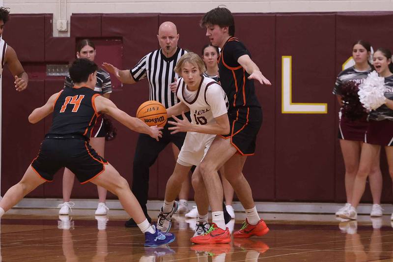 Lockport’s Nujus Venckus looks to dish off the rebound against Lincoln-Way West on Friday, Dec. 6, 2024 in Lockport.