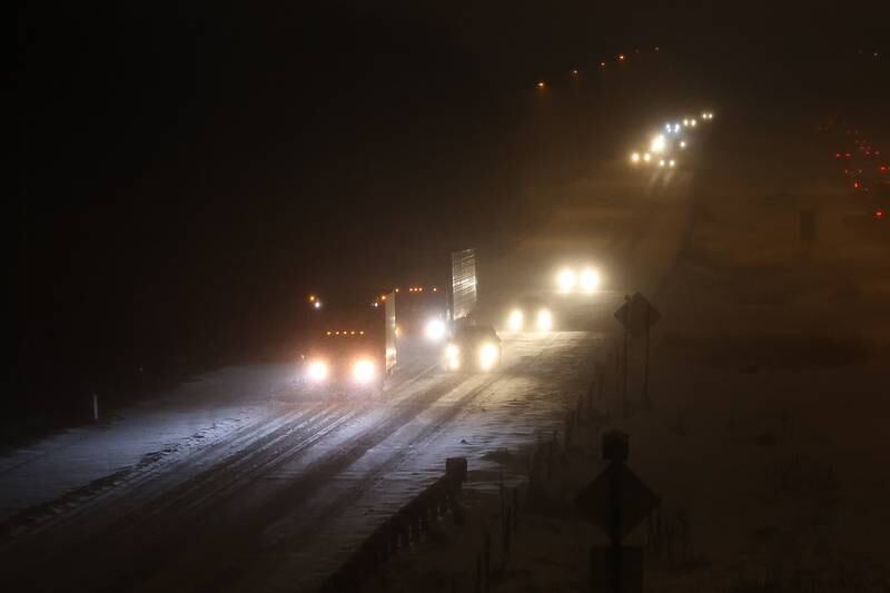 Traffic moves along slowly on east bound I-80 early Wednesday morning. Wednesday, Feb. 2, 2022 in Joliet.