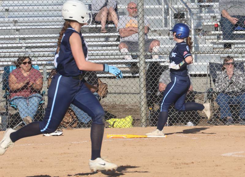 Bureau Valley's Abby Jamison scores as teammate Danicka Benavidez runs to second against Hall on Monday, March 9, 2026 at Bureau Valley High School.