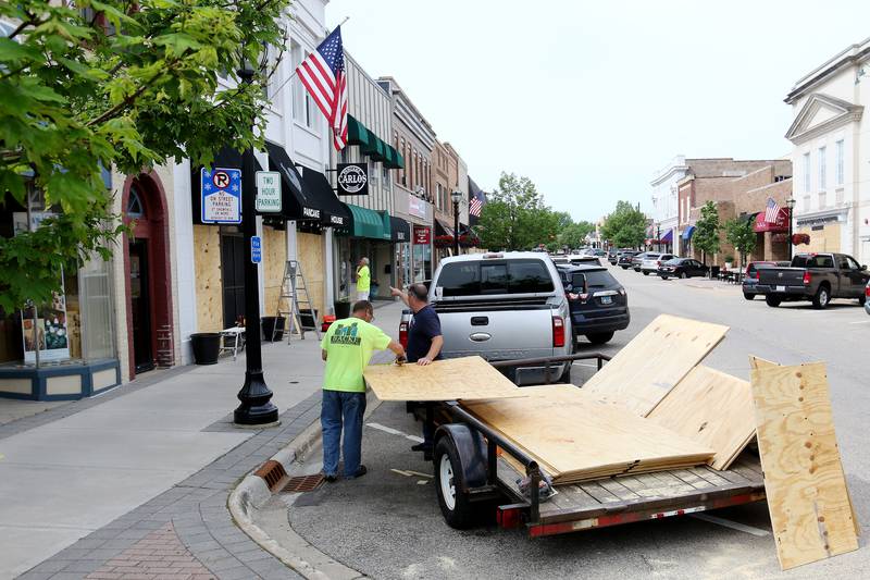 Businesses are boarded up prior to a Black Lives Matter protest on Friday, June 5, 2020 in downtown Crystal Lake. The precautionary measures on behalf of the building landlords are in response to other recent Black Lives Matters rallies which had become violent and resulted in looting.