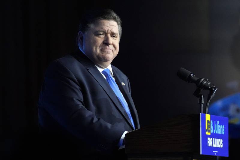 FILE - Illinois Gov. J.B. Pritzker looks to supporters after he defeated GOP challenger Darren Bailey on Nov. 8, 2022, in Chicago. On Saturday, Jan. 7, 2023, a day after Illinois House Democrats approved pay raises for top government officials in late-night budget legislation — include a 16% hike for them — Pritzker told reporters that he only asked lawmakers to approve increase for his departments heads in order to attract top talent. He said the Legislature is a co-equal branch of government and he is focused on the executive branch. (AP Photo/Nam Y. Huh, File)
