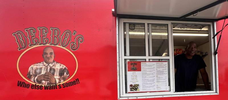 Owner Tommie Wallace stands ready to greet customers at his food truck, Deebo's, located in the parking lot of the 301 North convenience store at 301 N. Galena Ave. in Dixon.