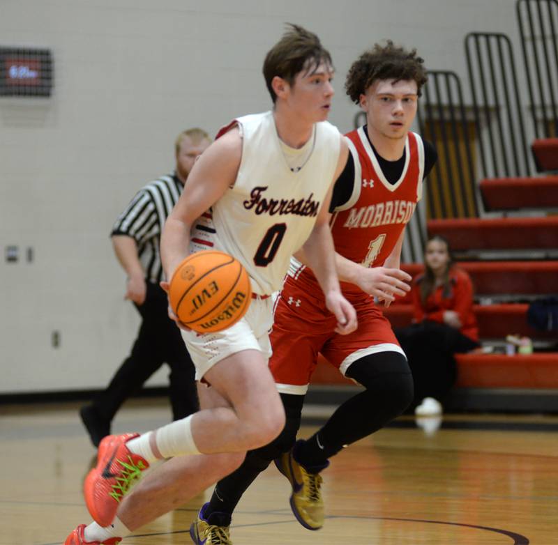 Forreston's Brendan Greenfield (00) leads the fast break as Morrison's Dawson Hepner (1) follows during a Saturday, Feb. 8, 2025 game at Forreston High School.