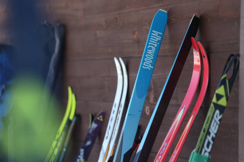 Skis rest up along the side of the clubhouse at the Joliet Nordic Ski Club 4k and 12k race on Saturday, Jan. 20th, 2024 at Woodruff Golf Course in Joliet.